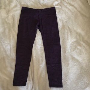 Pink and black striped yoga pants.